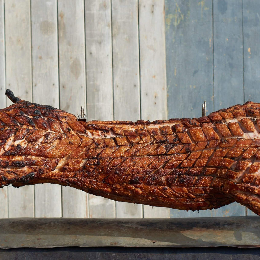 Spit roast and barbecue pork meat